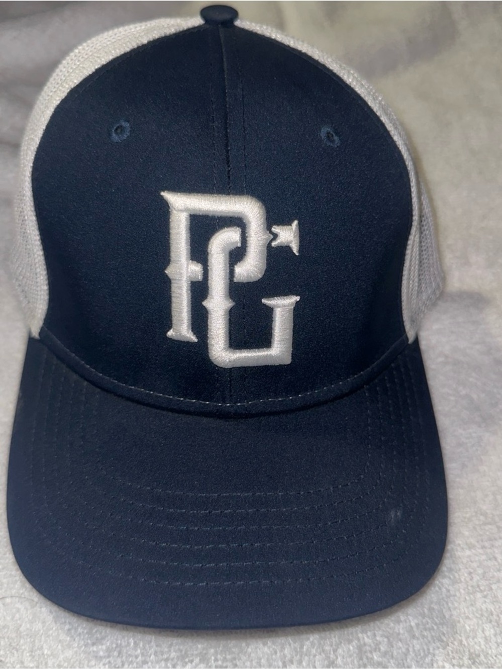 Navy and White Mesh Trucker Hat with Raised Logo